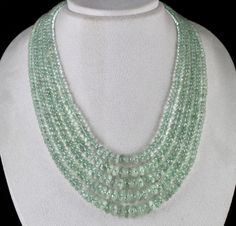 PRODUCT DETAILS LINE 5/CTS 939 GREEN AMETHYST FACETED BEADS SIZES OF THE BEADS IS 10MM TO 5MM INNER LENGTH OF THE NECKLACE IS 17 INCHES OUTER LENGTH OF THE NECKLACE IS 20 INCHES GREEN AMETHYST ATTACHED TO SPECIAL SIZABLE SILK CORD BUY IT NOW... NOTE - #You will receive the same product you see in picture. #DEAR ETSY BUYERS PLEASE FEEL FREE TO ASK QUESTIONS #WE WILL BE GLAD TO ANSWER & SOLVE QUERY REGARDING THIS PRODUCTS #RETURN POLICY Every piece of jewellery and inputs (gem stones, diamonds Elegant Green Gemstones With Faceted Beads, Elegant Green Faceted Beads Gemstones, Round Bead Necklace, White Moonstone, Silk Cord, Gem Stones, Green Necklace, Green Amethyst, Rock Crystal