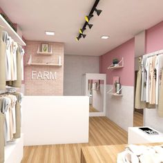 the interior of a clothing store with pink walls