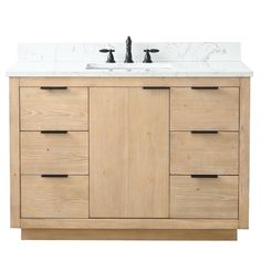 a bathroom vanity with marble top and two faucets on the sink, against a white background