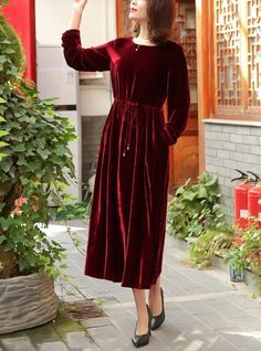 "★ Material: Velvet ★ Model Size: -- Model wear size M -- Model is 170 cm / 5'8\" -- Model measurements (bust 31\" / waist 26\" / hips 36\" ) ★ In order to make it more suitable for you. please tell me your body measurements : -- your Height -- your Weight -- your Bust -- Phone number for shipping Size S (US 4-6 | UK/AU 8-10 ) Bust: 88 cm / 34.6 inch Length: 120 cm / 47.2 inch Sleeve Length:55 cm / 21.6 inch Size M (US 8-10 / UK/AU 12-14) Bust: 94 cm / 37 inch Length: 120 cm / 47.2 inch Sleeve L Red Velvet Long Sleeve Dress For Fall, Fall Velvet Midi Dress, Winter Dress Down Maxi Dress, Casual Midi Dress For Winter, Red Velvet Dress For Winter, Casual Long Sleeve Midi Dress For Winter, Winter Velvet Midi Dress, Knee-length Velvet Dress For Winter, Modest Knee-length Winter Dress