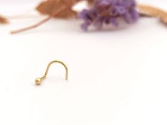 Beautiful minimalist 14K solid gold tiny dot boho nose stud, in L or screw shape, yellow rose or white gold. This nose stud is made of 14K Solid Gold and has a simple minimalist design of a small dot.A beautiful tiny dot nose stud that will suit any occasion. it is light and comfortable and will be perfect for everyday use. Thought small this little nose stud has a lot of character. Its design will go with any outfit or other jewelry you'll wear.  Get this cute stud and add a shine to your every Minimalist Hypoallergenic Yellow Gold Nose Studs, Minimalist Hypoallergenic Nose Studs As Gift, 14k Gold Minimalist Nose Studs For Gift, Minimalist Hypoallergenic Yellow Gold Nose Rings, Minimalist 14k Gold Nose Ring As Gift, Gold Minimalist Internally Threaded Nose Studs, Everyday Tiny Gold Nose Studs, Tiny Yellow Gold Minimalist Nose Rings, Tiny Minimalist Yellow Gold Nose Rings