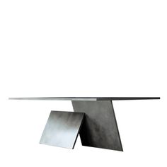 a table that has some kind of metal structure on it's base and is in the shape of a square