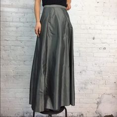 Almost New Gray Taffeta/Organza Long Skirt In Sz S. I Have Worn It In The Past With A Black Embroidered Or Gray Sequined Top. Black Top Is Listed Separately. Very Useful For A Sudden Event Since It Can Be Easily Dressed Up Or Down. Fully Lined As It Is Transparent Otherwise. No Defects Noted And Worn 2 Times For Functions - Pristine Condition Fitted Silk Maxi Skirt, Fitted Silk Maxi Full Skirt, Fitted Silk A-line Maxi Skirt, Silk Full Skirt Bottoms For Party, Silk Skirted Bottoms For Party, Sequined Top, Gray Silk, Silk Organza, Sequin Top