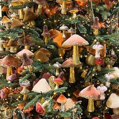 a christmas tree with many different types of mushrooms on it