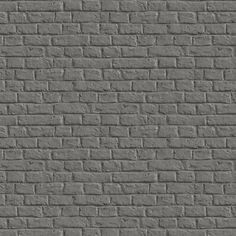 a gray brick wall textured with cement