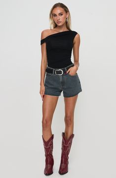 Made from nonstretch denim, these dark-wash shorts have a mid-rise waist and raw hems that create a casual-cool, sunny-day-ready aesthetic. Zip fly with button closure Five-pocket style 100% cotton Machine wash, tumble dry Imported Mid Rise Denim Shorts, Baby Crop Top, Perfect Summer Outfit, Pink Formal Dresses, High Heel Sneakers, Denim Cutoff Shorts, New Pant, Strapless Tops, Loungewear Sets