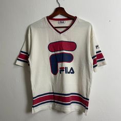 PLEASE READ DESCRIPTION FIRST BEFORE BUYING‼️ Vintage Fila Big Logo Tee CONDITION - Pre-owned. Original Item - Used condition (scale 9.5/10) - No hole, no rip and no stain - Refer picture TAG AND MATERIALS - Label : Fila - Size on tag : F ( from measurement it fit to size S) - Made : - PAYMENT - Accept PAYPAL only SHIPPING - This item will be ship along with Tracking Number after received a completed payment. - Please leave your phone number for shipping requirement after made purchasing 📌SHIPPING METHOD📌 1) Standard Ship $18 ▶️ 2-3 Weeks 2) DHL Express Ship $25 ▶️5-7 Day Contact us if u have any inquiries ⚡DISCOUNTS FOR MULTIPLE ITEMS 🙏 THANKS FOR VISITED MY STORE 🙏 ATTENTION : Please pay close attention to measurements provided. Do not rely on tag size as pre-worn items may have been Fila Vintage, Mens T Shirts, Logo Tee, Mens Graphic Tee, Logo Tees, Dhl Express, Vintage Tees, Tshirt Logo, Phone Number