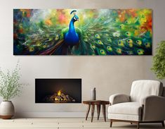 a peacock painting on the wall next to a fire place