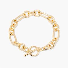 Feel beautiful wearing our Monroe Toggle Bracelet, crafted from a luxe link chain with an easy toggle closure. Dare to stand out wearing the perfect balance of contemporary and classic style in gold. Make the Monroe Toggle Bracelet your signature accessory and be surprised by the endless compliments you receive. Dare to shine with Monroe. Available in 14k gold plated brass 7" link chain 1/2" toggle closure SKU: BYB1171 Trendy Chain Bracelet With Toggle Clasp, Chic Gold Chain Paperclip Bracelet With Oval Links, Gold Chain Bracelet For Everyday, Classic Gold-tone Bracelets With Toggle Clasp, Gold Chic Toggle Necklace For Everyday, Gold Chain Bracelet With Toggle Clasp And Rectangular Links, Gold Bracelets With Toggle Clasp For Everyday, Everyday Link Chain Bracelet With Toggle Clasp, Everyday Yellow Gold Chain Bracelet With Toggle Clasp