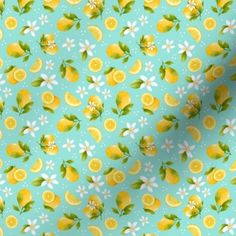 a blue background with yellow lemons and daisies