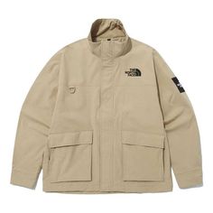 THE NORTH FACE Nylon Street Style 'Brown' NJ3BP07K Beige Nylon Outerwear For Outdoor Activities, Sporty Beige Windbreaker For Outdoor, Brown Windbreaker With Pockets For Outdoor Activities, Functional Beige Windbreaker For Outdoor, Sporty Brown Outerwear For Outdoor, Urban Brown Windbreaker For Outdoor, Beige Utility Windbreaker For Outdoor, Utility Style Beige Windbreaker For Outdoor Use, Beige Functional Outdoor Windbreaker