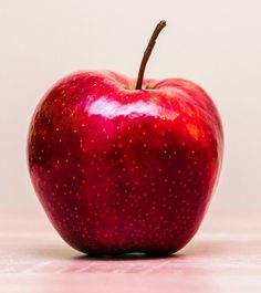 an apple sitting on top of a table