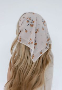 Our bandanas are not only versatile, they are trendy + unique too. Wear them around your head many different ways, tie around your neck, or accent your bags! It measures in a square shape approximately 20x20 inches long. Style in a ponytail, wear around your neck, on a bag, or on top of your head. This bandana comes in a KAXI original print on an off white base with orange florals. This print is perfect for spring! Kaxi original design: Designed in house. You won’t find this product anywhere els Trendy Accessories On Peoeple, Cheap Trendy Summer Bandana, Bandana Hair Styling Accessories, Trendy Cheap Headscarf For Spring, Cheap Spring Bandana, Head Bandana, Bow Ponytail, Neutral Print, Hair Cuffs