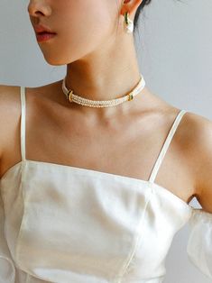 Metal: 18k Recycled Gold Plated On Brass Pearl: Freshwater Pearls Gemstone: Cubic Zirconia Chain Length: 340-390mm Weight: 28.5g Elegant Multi-strand Gold Plated Jewelry, White Double Strand Clavicle Chain Jewelry, Elegant Multi-strand Gold Plated Necklace, White Multi-strand Clavicle Chain Jewelry, Elegant Gold Plated Clavicle Chain Choker, Elegant Gold-plated Clavicle Chain Choker, Elegant Multi-strand Clavicle Chain Choker, White Multi-strand Clavicle Chain Necklace, Elegant Adjustable Yellow Gold Beaded Necklace