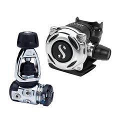 two different types of fishing reels on a white background, one is silver and the other is black