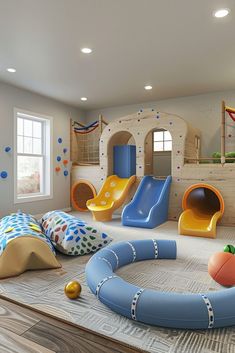 an indoor play area with slides and toys