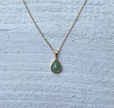 This necklace is handmade with a genuine green aventurine stone. The necklace is made of stainless steel and plated with 18k gold. The chain length is 17 inches and can be adjusted to be shorter. This necklace is hypoallergenic. (Cadium free, lead free, and nickel safe) Aventurine is a stone that promotes good luck, creativity, and prosperity. The necklace comes in a ribbon-wrapped box and is ready to be gifted. If you would like to leave a note, you can do so during checkout. Green Teardrop Necklace With Adjustable Chain, Green Teardrop Necklace For May Birthstone, Green Teardrop Minimalist Necklace, Minimalist Green Teardrop Pendant Necklace, Gold Teardrop Emerald Necklace, Minimalist Green Teardrop Necklace, Blossom Outfit, Dangly Necklace, Green Aventurine Stone