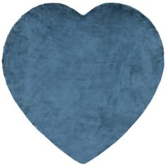 a blue heart shaped rug on a white background