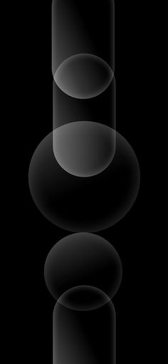 an abstract black and white photo with three circles on the bottom, one circle in the middle