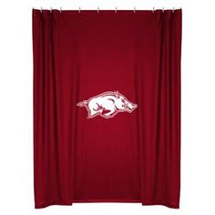 the university of wisconsin logo is shown on a red curtain in front of a white background