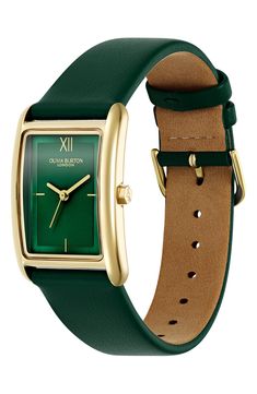 A minimalist dial adds streamlined elegance to a slim rectangular watch set on a rich leather strap for luxe appeal. 23mm case; 18mm band width Buckle closure Quartz movement Stainless steel or stainless steel with goldtone plate/leather Imported Modern Rectangular Watches For Everyday Use, Modern Everyday Rectangular Watch, Rectangular Quartz Watches For Everyday Use, Elegant Watches For Everyday Use With Rectangular Shape, Modern Rectangular Watch With Leather Strap, Rectangular Analog Watches For Everyday Use, Classic Rectangular Watch Accessories For Everyday, Modern Green Watch Accessories With Rectangular Dial, Classic Everyday Rectangular Watch Accessories