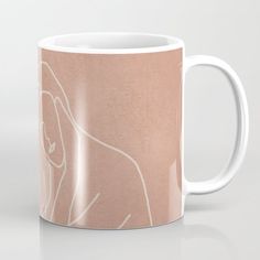 a coffee mug with a drawing of a woman on it