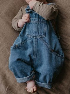 Made in classic cotton denim, our relaxed-fit dungaree is the perfect piece to live in all season. It features adjustable straps, and a comfy, oversized fit for carefree playdays indoors and out. Our small-batch wash process means that each of our denim garments will vary slightly in color and appearance. Machine wash cold on delicate cycle Lay flat to dry and iron on low if desired Reshape whilst damp to maintain shape and structure The Simple Folk, Denim Dungaree, Halloween Pajamas, Pajama Outfits, Knit Mittens, Light Denim, Dungarees, Clothes Gift