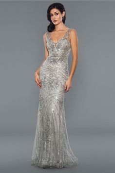 Stella Couture 21048 Sleeveless Beaded Sheath Prom Evening Gown - SILVER / 12 - Dresses Silver Gowns Elegant Evening, Silver Gowns Elegant, Silver Evening Gowns, Champagne Formal Dresses, Plus Size Sequin Dresses, Modest Formal Dresses, 18th Bday, Navy Blue Bridesmaid Dresses, Silver Gown