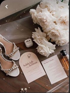 wedding shoes and flowers on the table