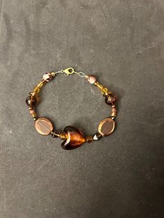 Brown beaded bracelet Glass Bracelet, Beaded Bracelet, Elk, Favorite Jewelry, Jewelry Bracelets, Accessory Gift, Beaded Bracelets, Ships, United States