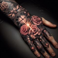 a person's hand covered in tattoos with roses and an old clock on it