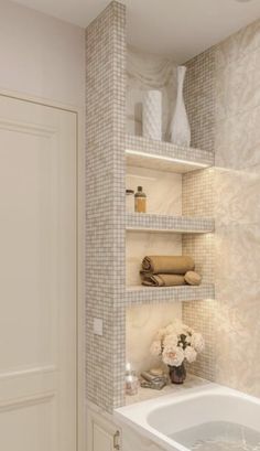 a bath room with a tub and a shelf