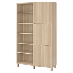 a wooden bookcase with three shelves on one side and two drawers on the other