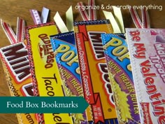 four candy bars are lined up on a table