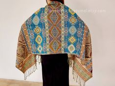 Folk Style Handwoven Shawl, Handwoven Folk Shawl One Size, Blue Bohemian Handwoven Shawl, Traditional Woven Winter Shawl, Bohemian Woven Winter Shawl, Folk Style Pashmina Shawl, Bohemian Winter Festive Scarves, Bohemian Winter Scarves For Festive Occasions, Multicolor Bohemian Shawl As A Gift