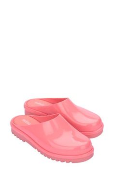 Easy to slip into, this water-resistant clog made from signature fruit-scented PVC features a soft, cushioned insole to keep feet happy all day long. Water-resistant MELFLEX™ PVC is durable, flexible, hypoallergenic and recyclable MELFLEX PVC upper and lining/synthetic sole Made in Brazil Casual Slip-on Plastic Clogs, Comfortable Pink Slip-on Clogs, Cute Slip-on Plastic Clogs, Pink Slip-on Clogs With Removable Insole, Pink Non-slip Summer Jelly Sandals, Birkenstock Gizeh, Made In Brazil, Womens Clogs, Clogs