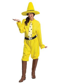 a woman dressed in a yellow costume with brown boots and a polka dot tie, holding out her hand