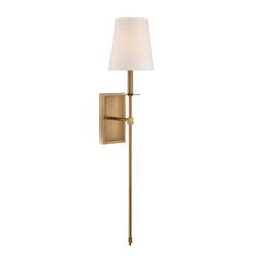 a wall light with a white shade on the side and a gold metal pole attached to it