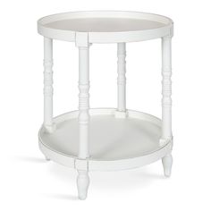 a white round table with two legs and a shelf on one side that holds a glass top