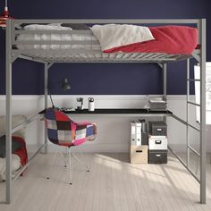 a blue bunk bed sitting next to a desk