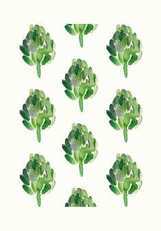 broccoli art print on white paper with green leaves in the middle and bottom