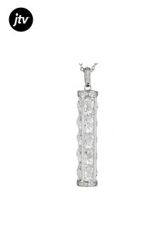 Bella Luce �� white diamond simulant 17.87ctw round, rhodium over sterling silver pendant with 18 inch chain. Measures approximately 5/8"L x 1/8"W and has a 2.5mm bail. Chain measures 18 inches and has a spring ring clasp closure. The diamond equivalent weight is 10.47ctw. Fine Jewelry Diamond White Channel Set Necklace, Elegant Sterling Silver Necklace With Channel Set, Diamond White Channel Set Necklace, Fine Jewelry White Necklace Channel Set, White Channel Set Fine Jewelry Necklace, Channel Set Cubic Zirconia Necklace Gift, Formal Cubic Zirconia Necklace With Channel Set, Formal Necklaces With Channel Set Cubic Zirconia, Formal Channel Set Cubic Zirconia Necklace