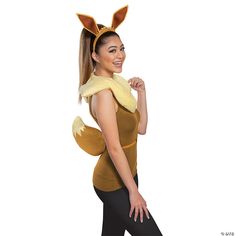 a woman is wearing a costume with ears on her head