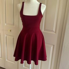 Akira Burgundy Mini Dress Size Small. Adjustable Thick Shoulder Straps. Scoop Neck. Mostly Backless. Never Worn. Excellent Condition. Red Solid Color Mini Dress For Date Night, Red Solid Color Mini Dress, Red Fit And Flare Mini Dress, Fitted A-line Burgundy Mini Dress, Burgundy A-line Mini Dress For Summer, Red Stretch Knee-length Mini Dress, Red Mini Dress With Spaghetti Straps And Built-in Bra, Casual Burgundy V-neck Mini Dress, Burgundy Mini Dress