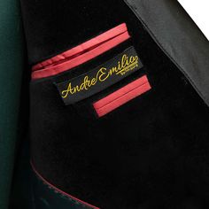 Package Includes: 1 x Jacket - 1 x Waistcoat - 1 x Pant

Stand out from the crowd at your formal events with the bespoke emerald green tuxedo, crafted from the most comfortable and durable fabrics. This bold and striking tuxedo features a rich green hue that is sure to turn heads, while the black lapel on the jacket and waistcoat adds an element of sophistication and elegance to the design. Perfect for the modern gentleman who isn't afraid to make a statement, our green tuxedo is the ultimate ch Winter Black Tuxedo With Pressed Crease, Fitted Green Sport Coat For Semi-formal Occasions, Luxury Winter Tuxedo With Pressed Crease, Green Evening Suit With Notch Lapel, Green Evening Suits With Notch Lapel, Green Notch Lapel Evening Suit, Elegant Tailored Dark Green Blazer, Tailored Green Evening Blazer, Tailored Green Blazer For Evening