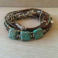 Boho Multi Strand Leather Wrap Bracelet Turquoise by DesignsbyNoa Turquoise Hand Wrapped Bracelets For Festivals, Bohemian Hand Wrapped Turquoise Braided Bracelets, Bohemian Turquoise Hand Wrapped Braided Bracelets, Bohemian Turquoise Hand-wrapped Braided Bracelets, Bohemian Turquoise Braided Bracelets, Adjustable Turquoise Wrap Bracelet For Festival, Adjustable Turquoise Bohemian Wrap Bracelet, Adjustable Bohemian Turquoise Wrap Bracelet, Turquoise Hand-wrapped Hippie Beaded Bracelets