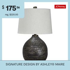 a table lamp with a price tag for $ 75