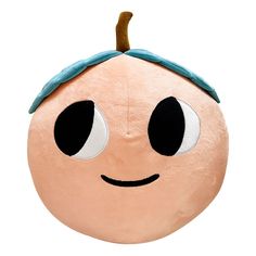 an orange with two eyes and a headband on it's side, sitting in front of a white background