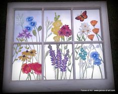 a window with flowers painted on it