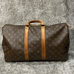 Authentic Louis Vuitton Big Bag For An Amazing Price! As Is, Zipper Functions Brown Color Gold Hardware Material: Monogram Country Of Manufacture : France Date Code Number: Sp1920 W (Inch) : Approx. 17.7” H (Inch) : Aprrox. 10.6” D (Inch) : Approx. 7.87” Shoulder/Handle (Inch) : 11.81” This Is A Pre-Owned Item And May Have Fading Or Discoloration, Marks Or Stains, Scratches, Wrinkling, Wear On Straps, Corners, Trim And Texture. If This Is An Issue, Buyers Should Purchase Items Brand New. Please Designer Brown Travel Bag With Large Capacity, Brown Monogram Canvas Travel Bag With Leather Handles, Brown Monogram Canvas Travel Bag With Luggage Sleeve, Classic Brown Travel Bag With Dust Bag, Travel Shoulder Bag In Cognac Monogram Canvas, Brown Monogram Canvas Travel Bag With Leather Trim, Elegant Brown Monogram Canvas Travel Bag, Brown Monogram Canvas Travel Bag, Classic Monogram Canvas Duffle Bag